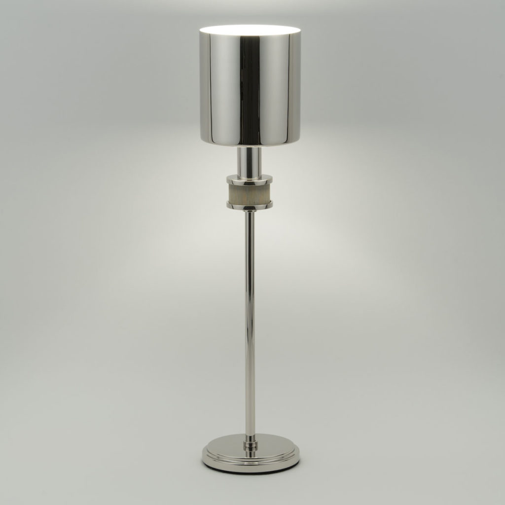 The Topanga Petite table lamp is a jewelry inspired take on a reading or desk lamp.
