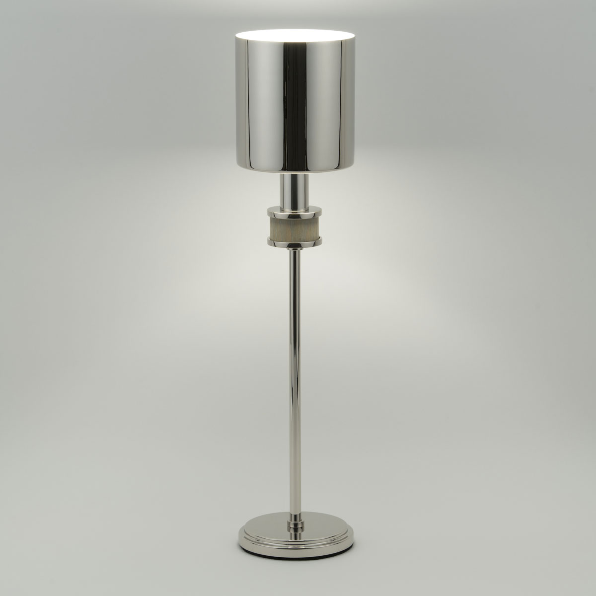 The Topanga Petite table lamp is a jewelry inspired take on a reading or desk lamp.